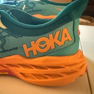 Hoka Speedgoat 5 women’s size 10.5 B Teal green, yellow orange, and hot pink.
